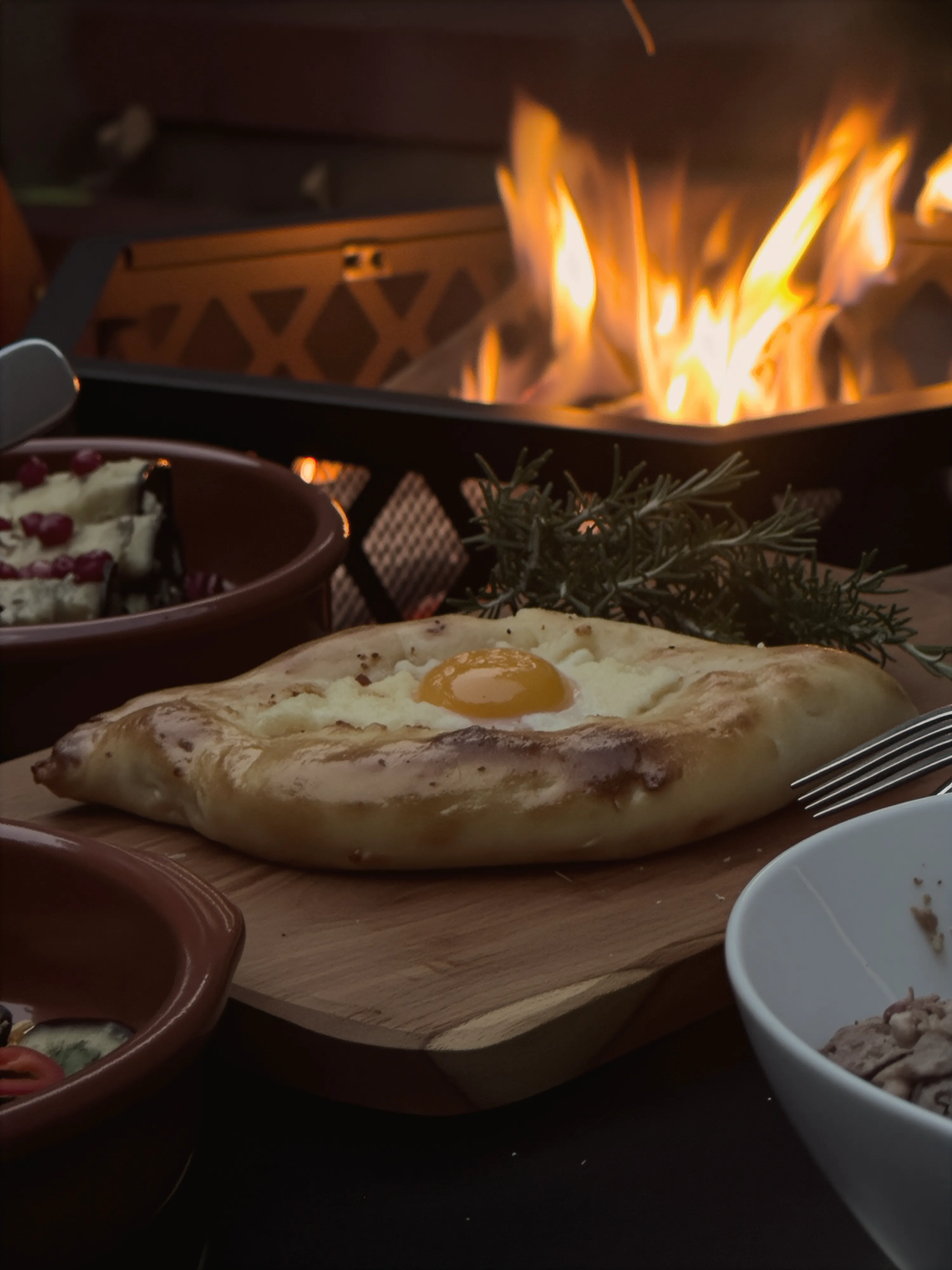 Khachapuri baking in the fire