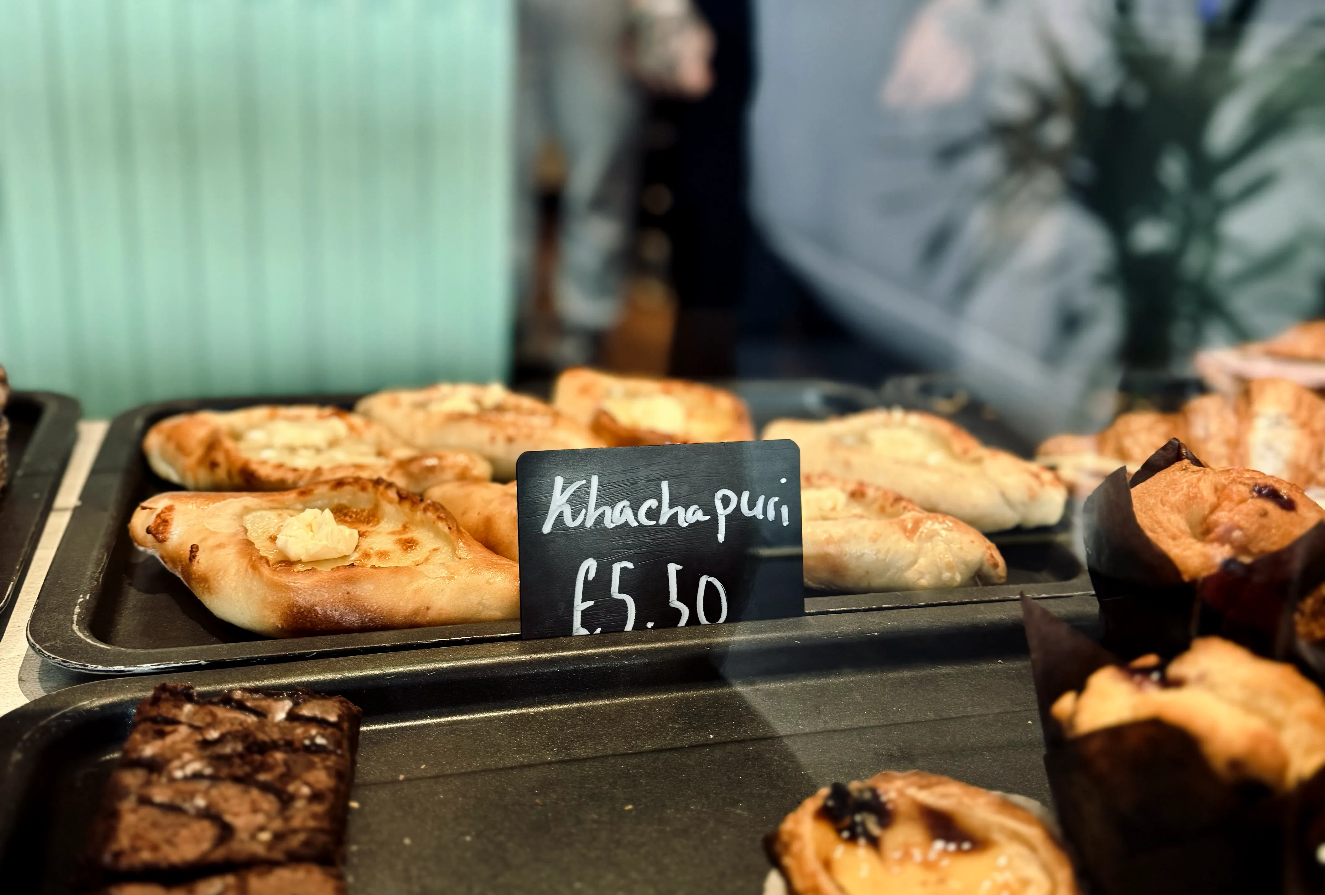 Khachapuri in Crystal Palace coffee shop display at Etudé