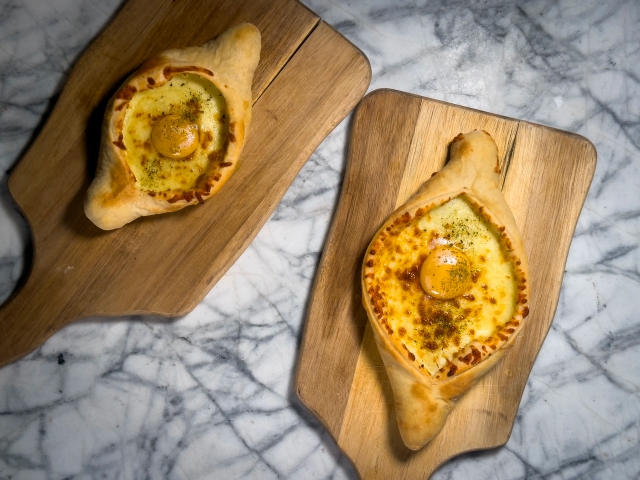 A pair of adjarian khachapuri